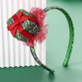 Détail du serre-tête de Noël avec nœud à paillettes vertes et dentelle rouge - Vert