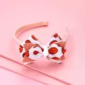 Dettaglio del cerchietto rosa glitterato con fiocco basket e dentini interni antiscivolo - Cerchietto Fiocco Basket