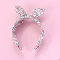 Close-up of floral fabric headband with cute rabbit ear knot in soft pink and blue tones - Pink Floral