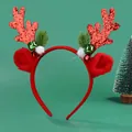 Detail of Christmas reindeer antler headband with sequins, bells, and faux fur ears - Red