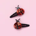 Detailed view of children's sequined beetle hair clips with non-slip cloth wrap base - Beetle Shape