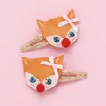 Detalle de dos lindas pinzas para el cabello de zorro hechas a mano con lazos rosas - Pinza Zorro