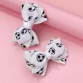 Détail de pinces à cheveux à nœuds avec motif football et paillettes argentées brillantes - Pince à Cheveux Nœud Football