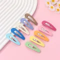 Close-up of ten matte colorful teardrop hair clips arranged on a pink aesthetic background - Multi-color Combination