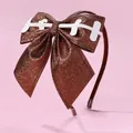 Close-up of glitter bow headband with football stitching detail and brown sparkle finish - Football Stitch Bow Style / Coffee