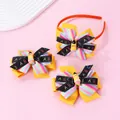 Detail view of school bows set featuring yellow pencil motifs and rainbow ribbon textures - Rainbow Letter Style