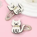 Cartoon white cat hair clips with gold sequin bows on pink decorative background - 2-Piece Set / White Cat Hair Clip