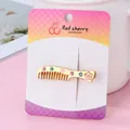 Creative comb shape hair clip in golden finish with pink flower and rhinestones - Matte Gold Comb