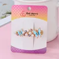 Elegant gold hair clip featuring blue enamel butterflies, white pearls, and pink rhinestones - Butterfly Pearl Gold
