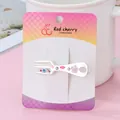 Creative silver alloy fork-shaped hair clip with purple floral and pink polka dot detail - Matte Silver Fork