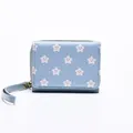 Short light blue wallet with pink smiley star print and wrist strap zip closure - Blue