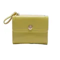 Portafoglio donna minimalista giallo brillante a tre ante con fibbia a fiore e zip - Giallo