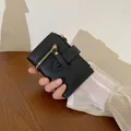 Elegant black multi-functional short wallet for women featuring a stylish zipper closure - Black