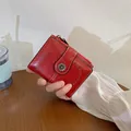 Portafoglio corto vintage in pelle rossa da donna con fibbia a girasole e cerniera - Rosso