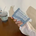 Light blue tweed mini card holder wallet for women in a portable handheld view - Blue