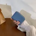 Portafoglio corto blu in pelle martellata con cerniera e scomparti per carte donna - Blu Denim