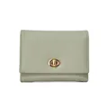 Short minimalist light green bifold wallet with lychee grain leather and metal twist lock - Green