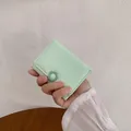 Slim mint green trifold mini wallet with floral clasp for women in matte synthetic leather - Light Green