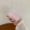 Pink trifold mini wallet for women featuring a 3D floral buckle and soft PU leather - Pink