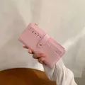 Portefeuille mince rose pour femme avec gaufrage à rayures et emplacements pour cartes - Rose Clair