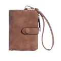 Brown matte short wallet for women featuring a snap closure and a wrist strap - Brown