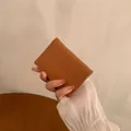 Kurze Damen Geldbörse aus braunem PU-Leder mit Litchi-Muster und praktischem Faltdesign - Braun