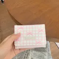 Portafoglio da donna a quadretti rosa e bianchi con fiocchi e patch cute girl - Rosa chiaro