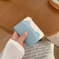Tarjetero fino de cuero tricolor con textura de lichi y cremallera dorada - Azul
