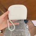 White crocodile pattern semi-circle card holder purse with elegant faux pearl wrist strap - White