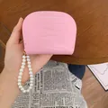 Pink semi-circle crocodile pattern card holder with pearl strap and gold lettering - Pink