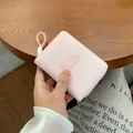 Pink minimalist trifold wallet featuring a cute cartoon bunny and a matching wrist strap - Light Pink