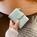 Portacarte corto in pelle verde menta con cinturino a fibbia e cerniera dorata - Blu Grigio