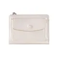 Detailed macro view of the cream white faux leather short wallet with a button flap pocket - White