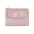 Close-up of pink glossy textured wallet featuring silver zipper and snap pocket detail - Pink