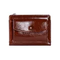 Detail view of glossy brown wallet with premium leather texture and precise stitching - Brown