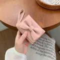 Mini portafoglio rosa da donna con fiocco decorativo e cinturino da polso chic - Rosa