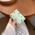 Short tri-fold light green wallet featuring strawberry and bow patterns in PU leather - Light Green