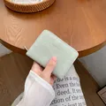 Short mint green zip wallet for women with unique vertical texture and silver logo - Grey Green