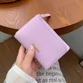 Litchi pattern lavender leather mini wallet with gold Classic Star logo and zip closure - Light Purple