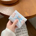 Piccolo portafoglio azzurro con fiocco da donna con simpatica stampa orso vintage - Blu Pallido