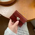 Portafoglio in pelle bordeaux effetto crepato con chiusura a cuore in argento lucido - Borgogna