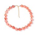 Minimalistische kralenketting met oranje marmeren kralen en rood touw - Koraal