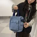 Hellblaue gewaschene Denim-Canvas-Rucksacktasche mit dunkelblauen Riemen und Reißverschluss - Einheitsgröße / Denim / Hellblau