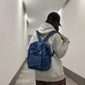 Dunkelblauer gewaschener Denim Rucksack mit Plissee-Struktur und Reißverschlusstasche - Einheitsgröße / Denim / Dunkelblau