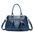 Dark blue ruched crossbody bag for women with multiple compartments and textured finish - Blue