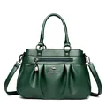 Dark green pleated leather handbag with dual handles and crossbody strap - Green