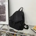 Minimalist black washed canvas backpack with multi-zipper compartments for daily use - Black