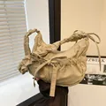 Chic beige ruched shoulder bag with cute bow details and adjustable ruffled strap - Khaki