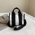 Minimalist black and white contrast canvas tote bag with adjustable shoulder strap - Black