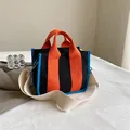 Contrast canvas tote bag in black and orange with a wide detachable shoulder strap - Orange